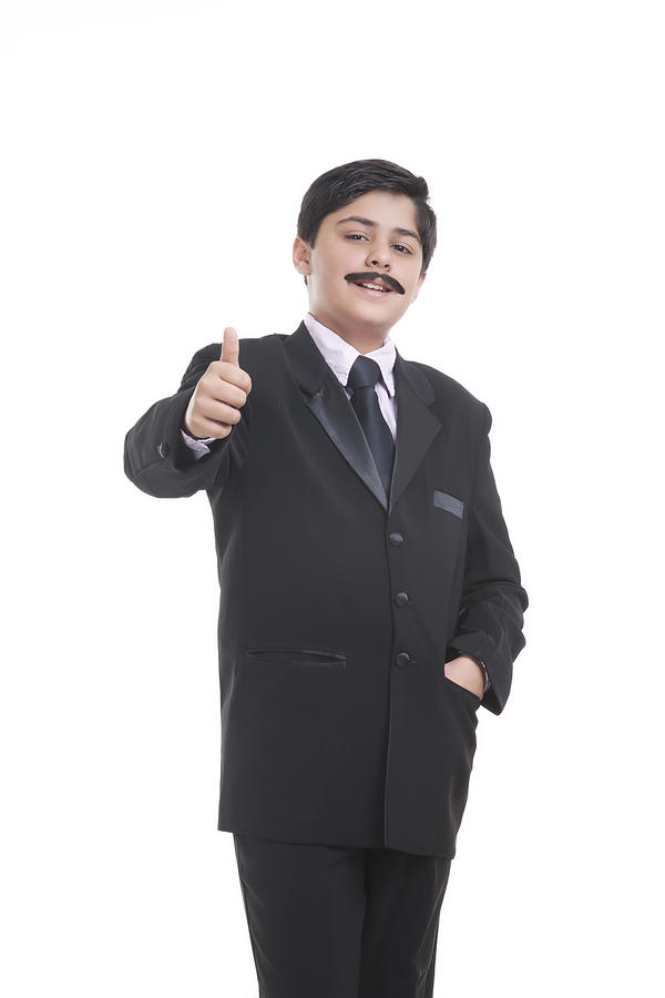 Portrait of boy dressed as businessman giving thumbs up Photograph by Sudipta Halder