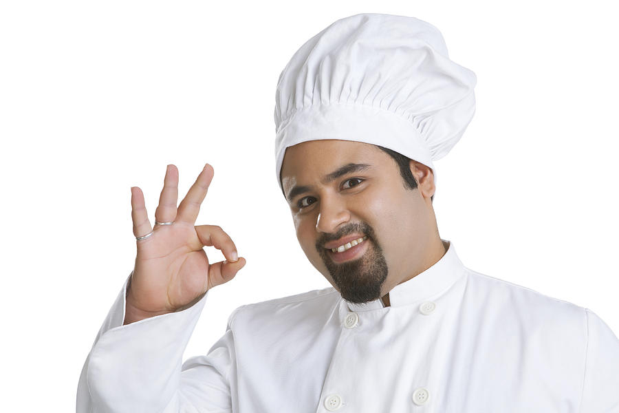 Portrait of chef giving ok hand gesture Photograph by Ravi Ranjan