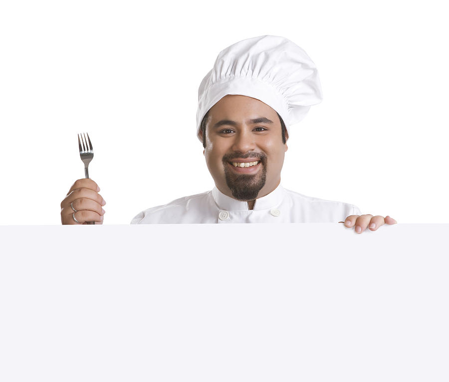 Portrait of chef with fork smiling Photograph by Ravi Ranjan