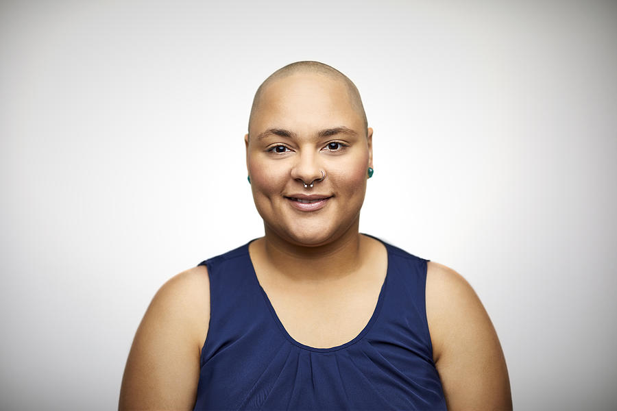 Portrait of confident woman with shaved head Photograph by Morsa Images