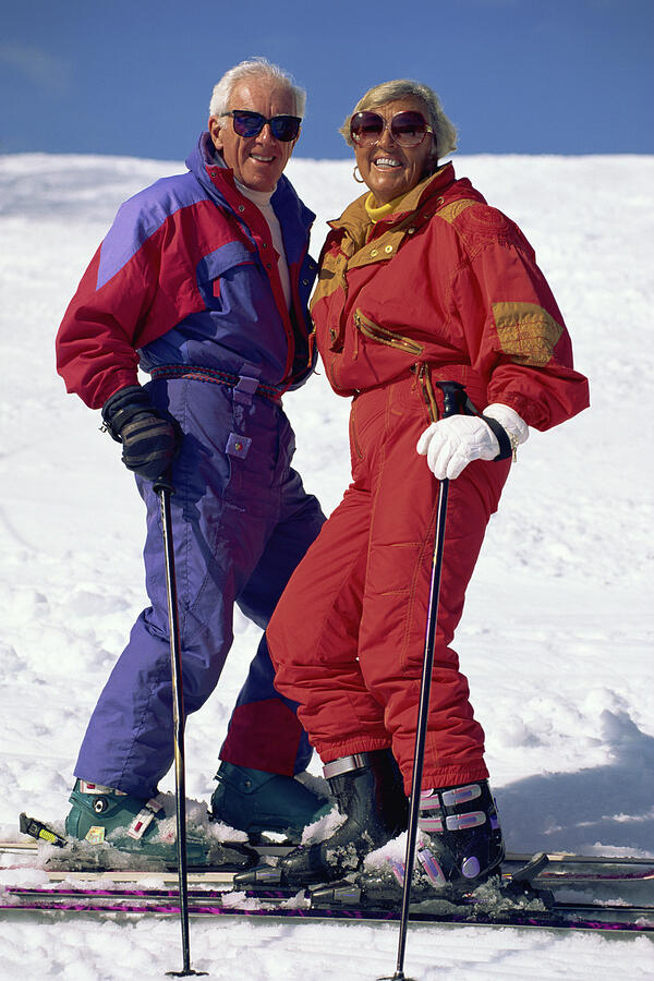 Portrait of couple skiing Photograph by Comstock Images