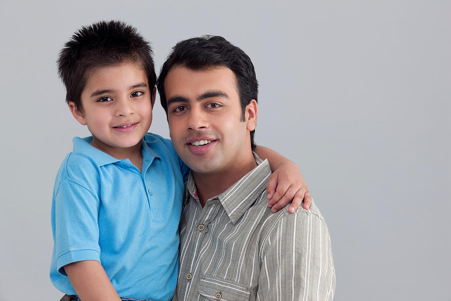 Portrait of father and son Photograph by Image Source