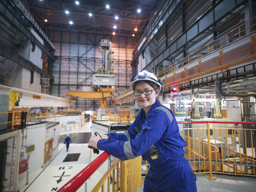 Portrait of female engineer in reactor hall in nuclear power station Photograph by Monty Rakusen