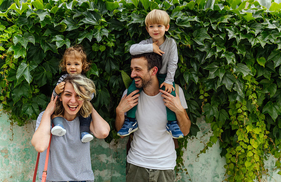 Portrait of happy family outdoors Photograph by AleksandarNakic