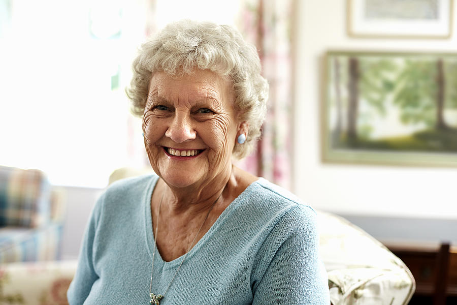 Portrait of happy senior woman Photograph by Morsa Images