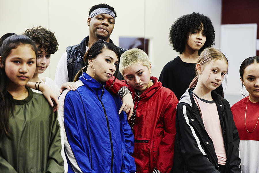 Portrait of hip hop dance group in studio after practice Photograph by Thomas Barwick