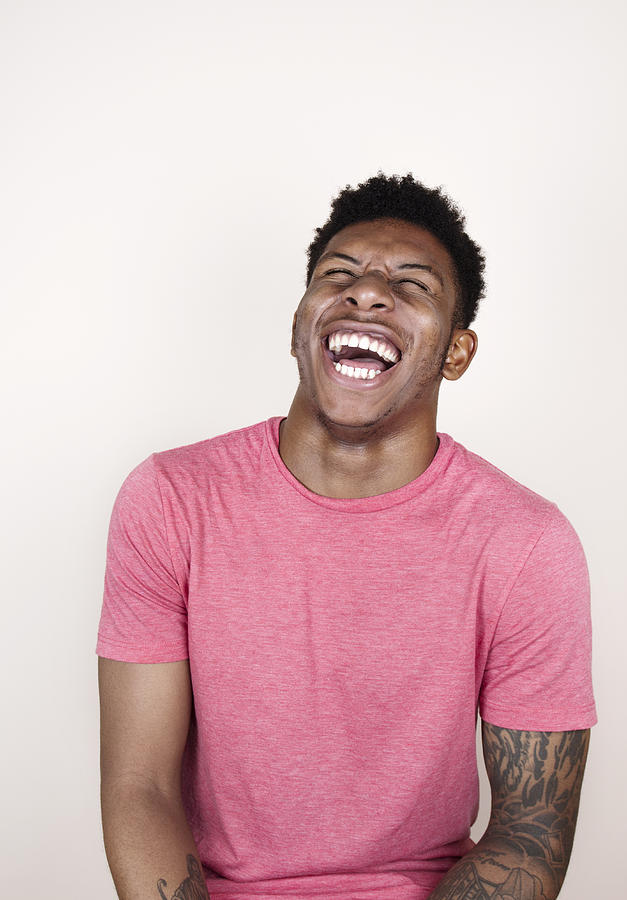 Portrait of man laughing Photograph by Flashpop