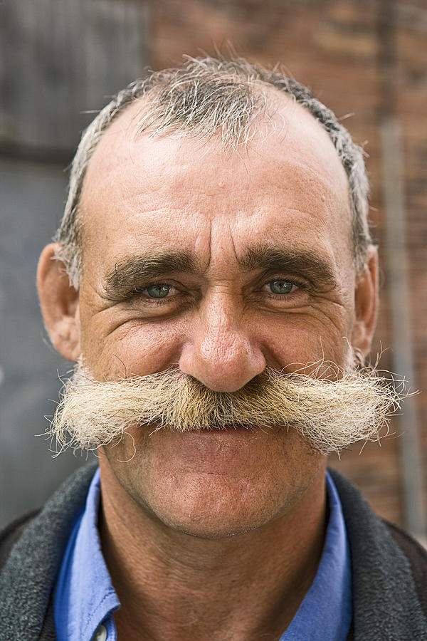 Portrait of man with mustache Photograph by Simon Willms
