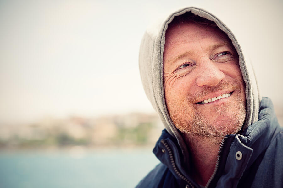 Portrait of mature Australian man in hood Photograph by LaraBelova
