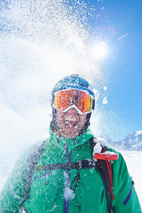 Portrait of mature male skier covered in powder snow, Mont Blanc massif, Graian Alps, France Photograph by Jakob Helbig