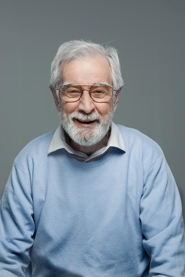 Portrait Of Mature Man Wearing Glasses Photograph by Howard Kingsnorth