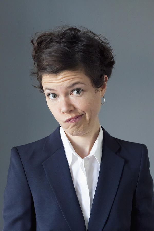 Portrait of mid adult woman making funny face, close-up Photograph by Ralf Hiemisch