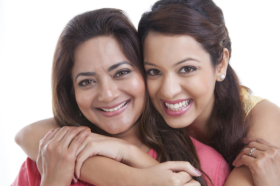 Portrait of mother and daughter smiling Photograph by Ravi Ranjan