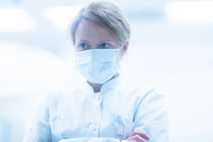 Portrait of radiologist wearing surgical mask Photograph by Sigrid Gombert