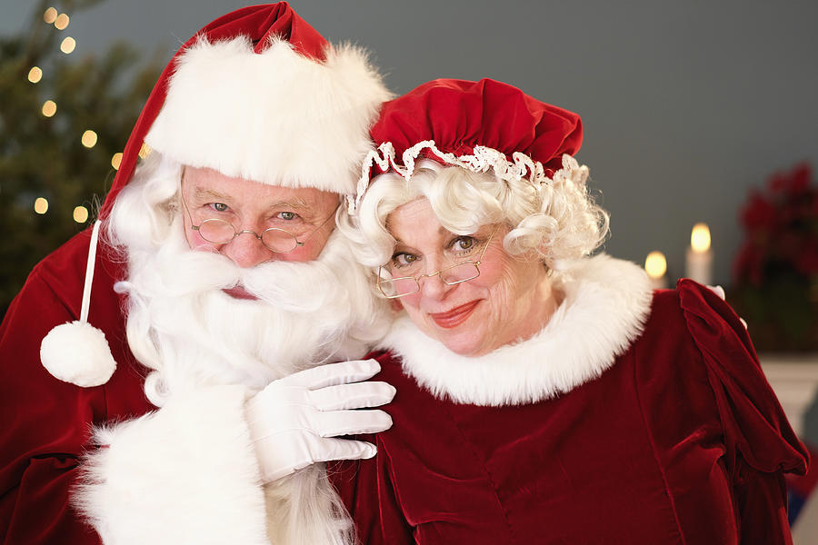 Portrait of Santa and Mrs. Claus Photograph by Tetra Images