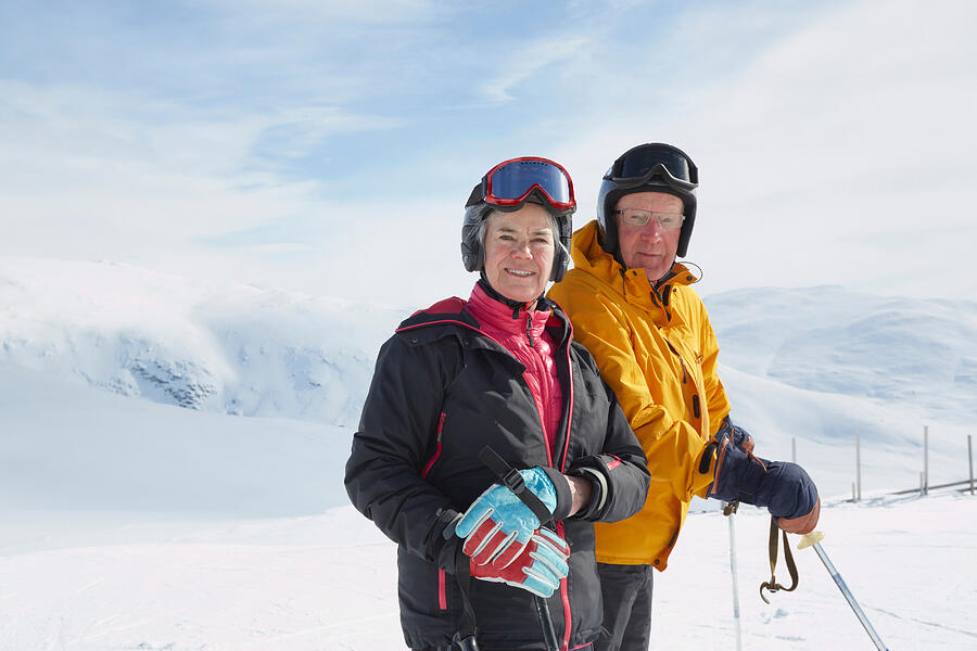 Portrait of senior couple skiing, Hermavan, Sweden Photograph by Frank and Helena
