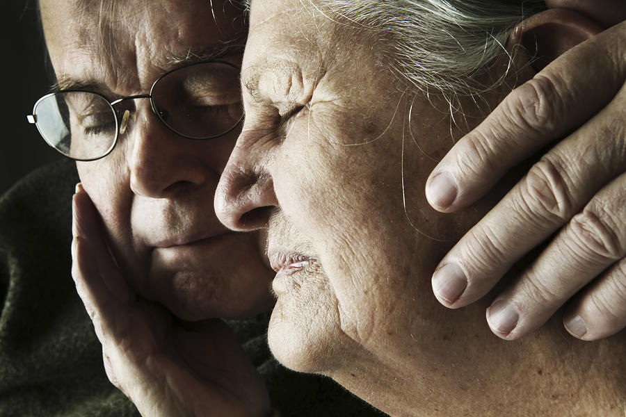 Portrait of senior couple with close eyes, close-up Photograph by Westend61