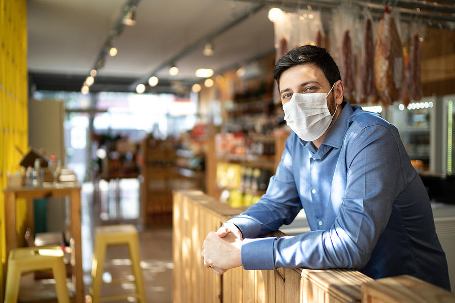 Portrait of small business man owner with face mask Photograph by FG Trade