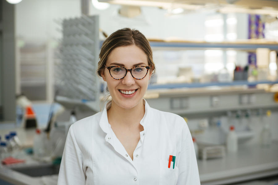 Portrait of smiling laboratory technician in lab Photograph by Westend61