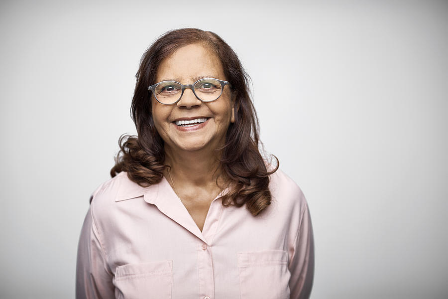 Portrait of smiling mature businesswoman Photograph by Morsa Images