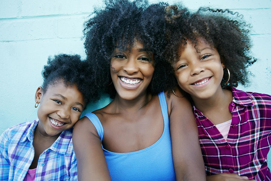 Portrait of smiling mother and daughters Photograph by Peathegee Inc