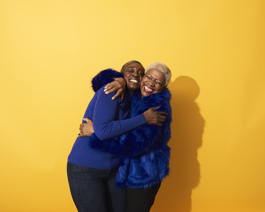 Portrait of two mature women dancing and having fun together Photograph by Flashpop