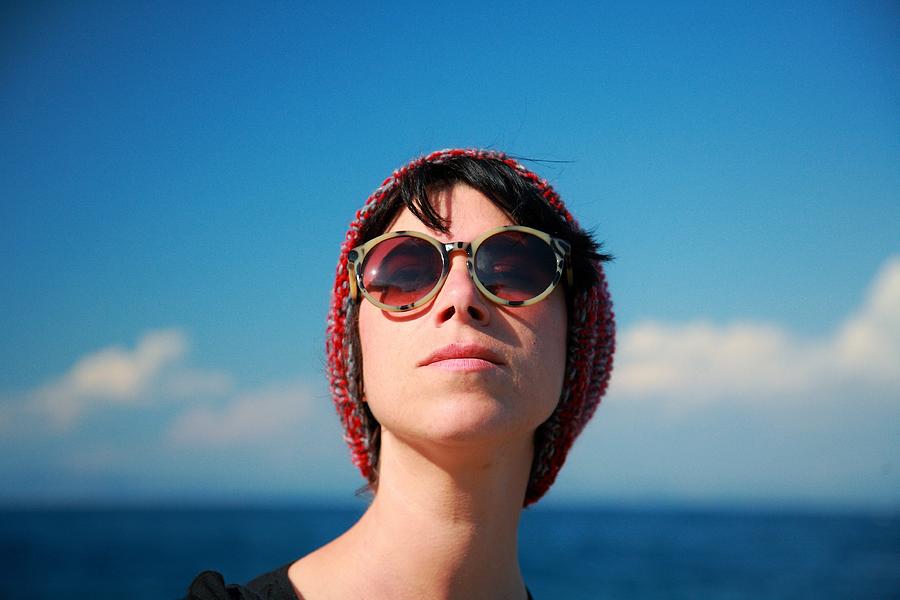 Portrait Of Woman Wearing Sunglasses Against Sky Photograph by Paolo Fiore / EyeEm