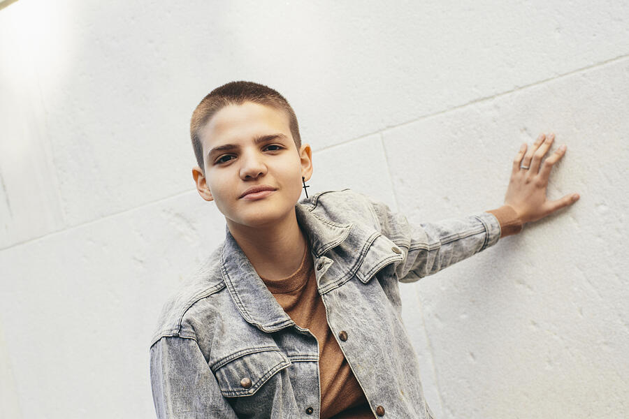 Portrait Of Young Adult Woman With Shaved Head Photograph by Process Visual