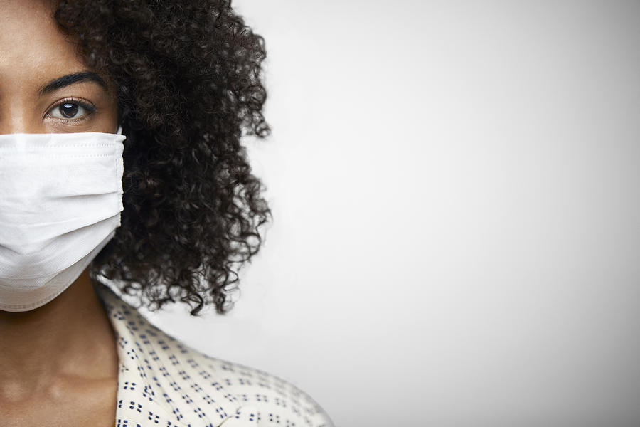Portrait Of Young African American Female With N95 Face Mask. Photograph by Morsa Images