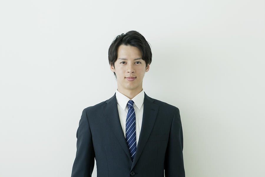 Portrait of young businessman Photograph by Indeed