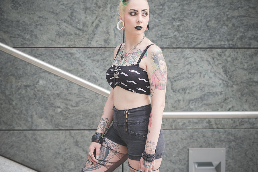 Portrait of young female tattooed punk on subway stairs Photograph by Eugenio Marongiu