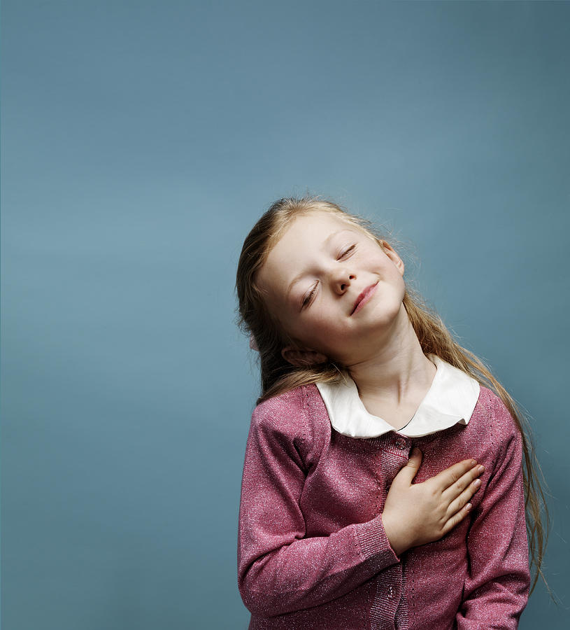 Portrait of young girl pledging alliance Photograph by Henrik Sorensen