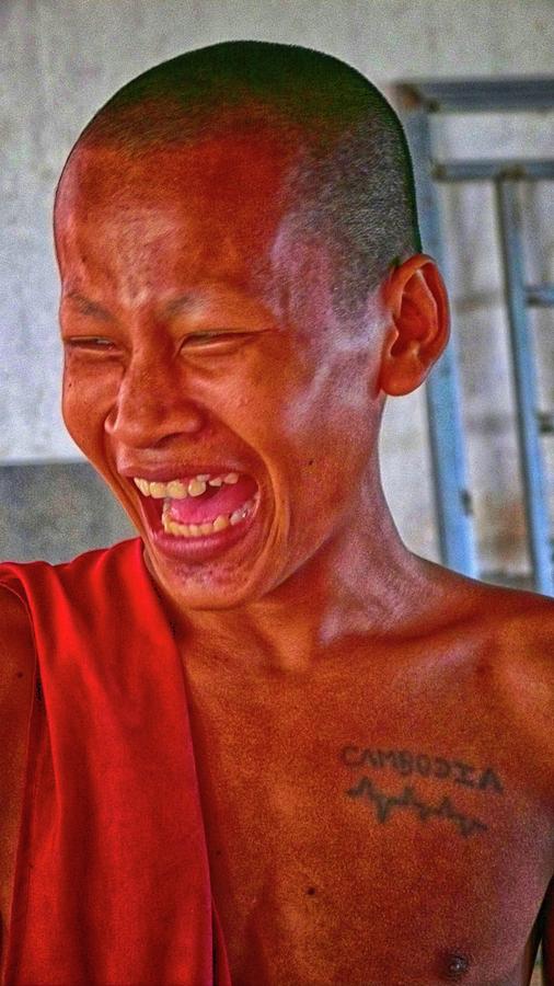 Portrait of young laughing monk Photograph by Robert Bociaga