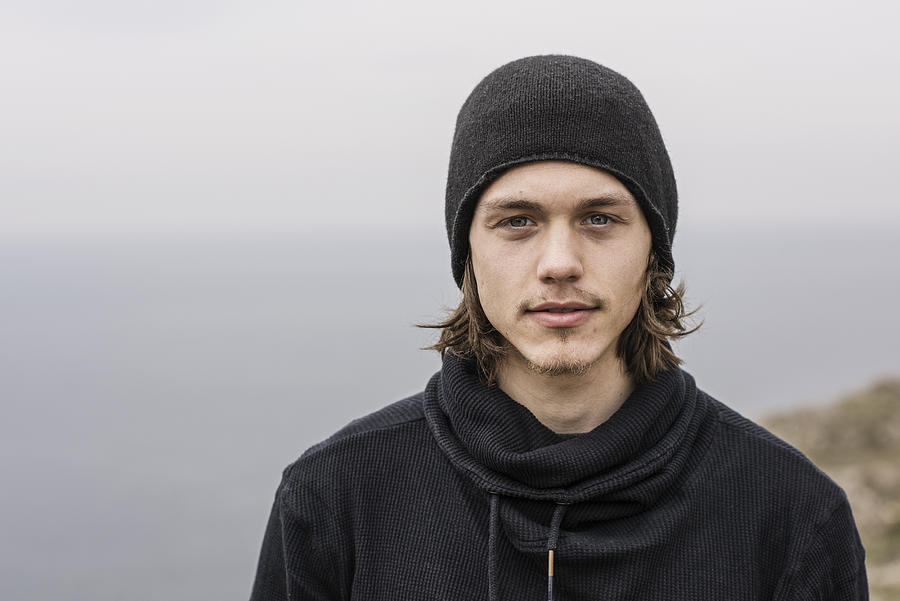 Portrait of young Man with long hair and hat Photograph by Robin Skjoldborg