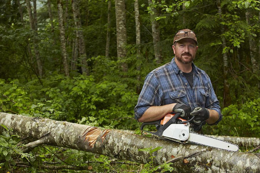 Portrait with Chainsaw Photograph by Blake Little