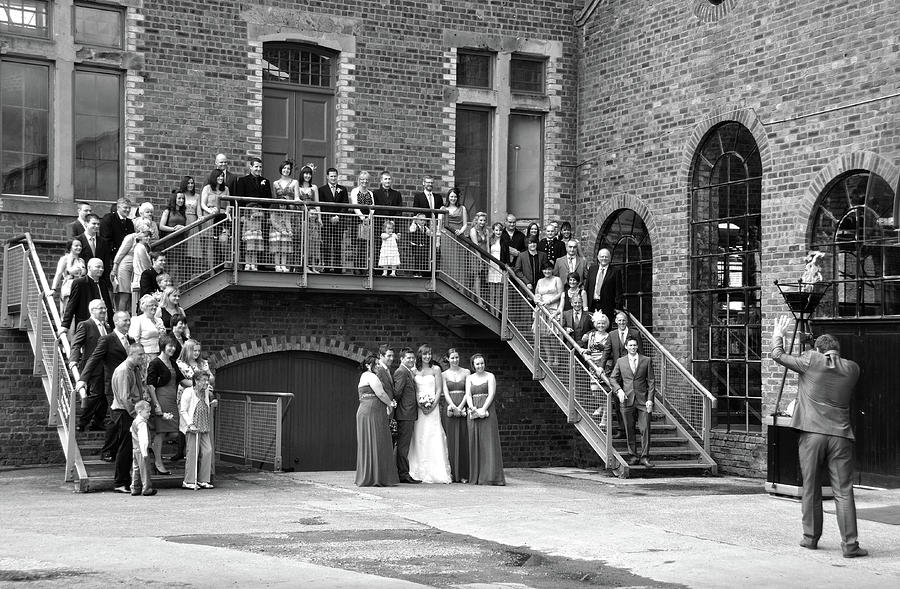 Posing for a family photo at a wedding at the National Museum of Mines in Scotland Photograph by RicardMN Photography
