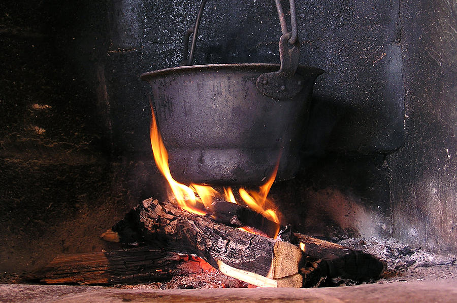 Pot on a fire Photograph by Farluk