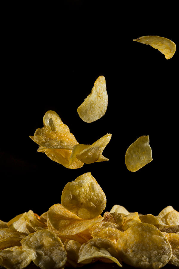 Potato Chips Dropping Photograph by R.Tsubin