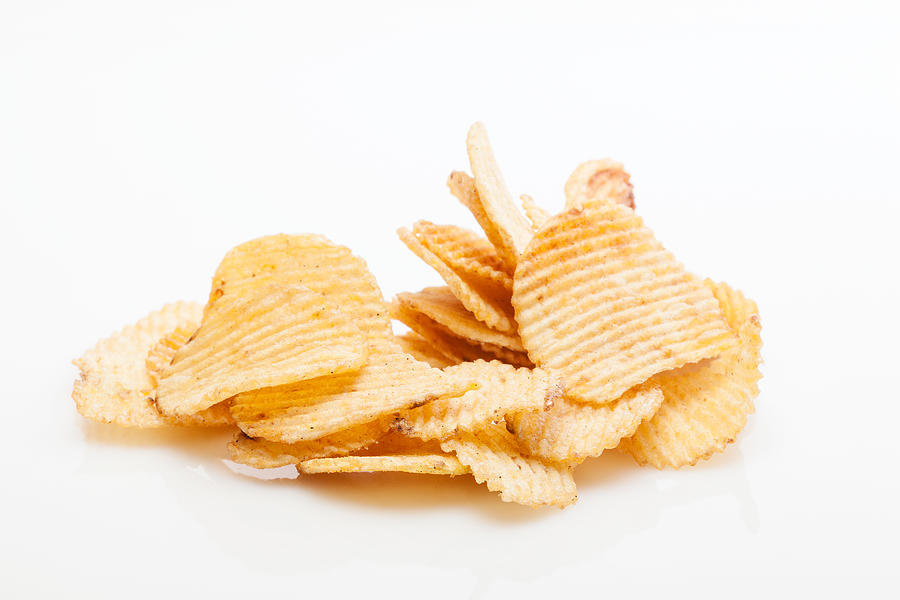 Potato chips Photograph by Fotek