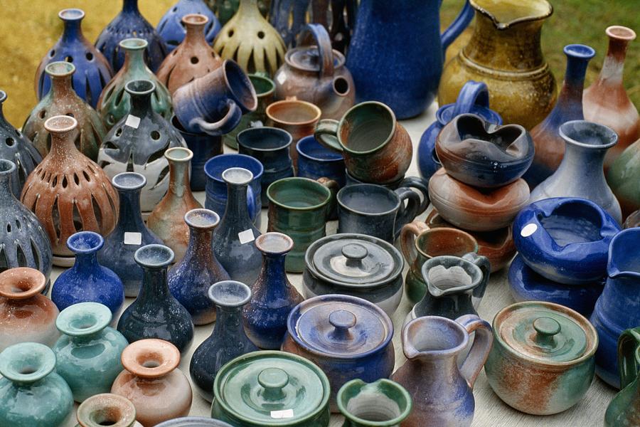 Pottery displayed at a roadside stand, Barbados Photograph by Glowimages