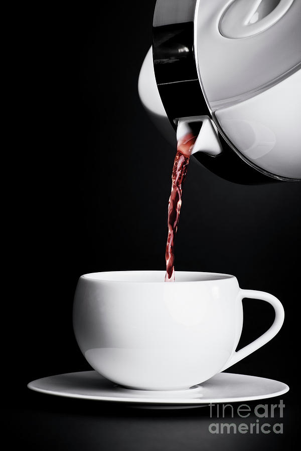 Pouring tea Photograph by Mendelex Photography