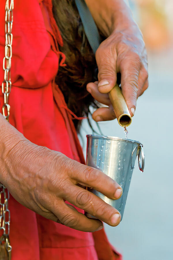 Pouring Water in Marrakech Photograph by Bill Chardon Pouring Water in Marrakech Photograph by Bill Chardon