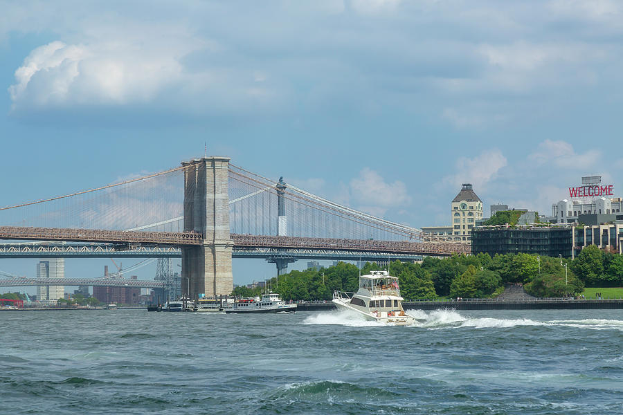 Power Boat and Brooklyn Bridge Photograph by Cate Franklyn