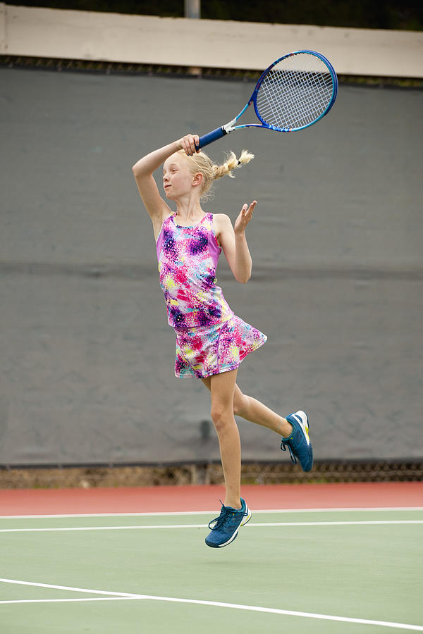 Powerful Tennis Forehand By A Small Girl Photograph by Stephen Simpson