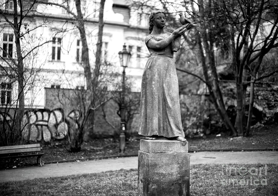 Prague Girl and Bird Statue Photograph by John Rizzuto