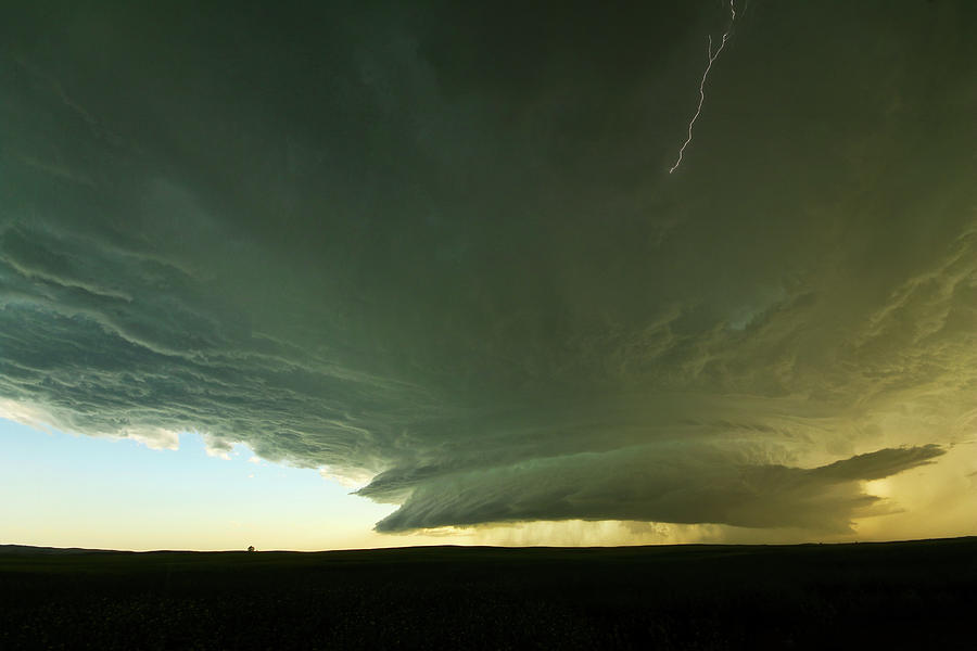 Prairie Beast and Lightning Photograph by Ryan Crouse