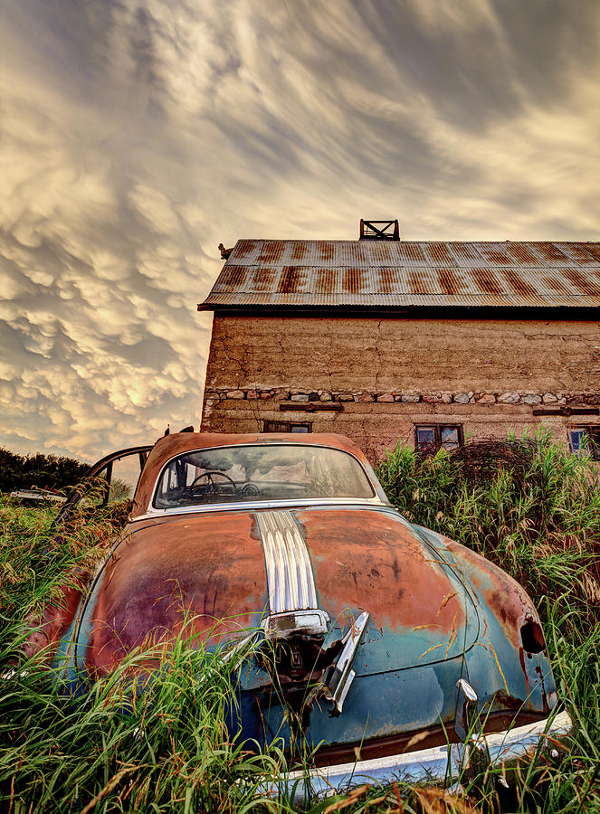 Nature Photograph - Prairie Storm antique car by Mark Duffy