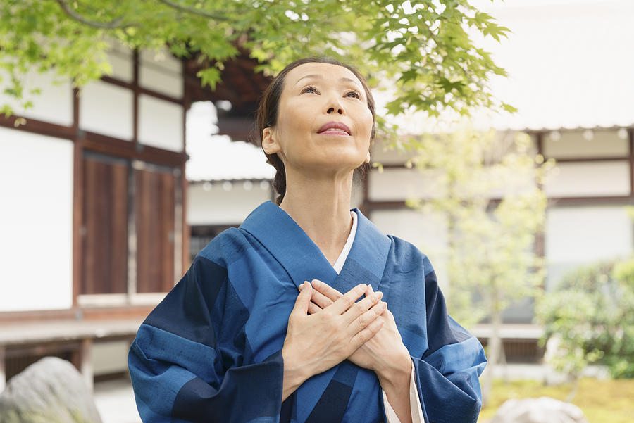 Praying Japanese Woman Looking Up with Joy Temple Kyoto Japan Photograph by Boogich