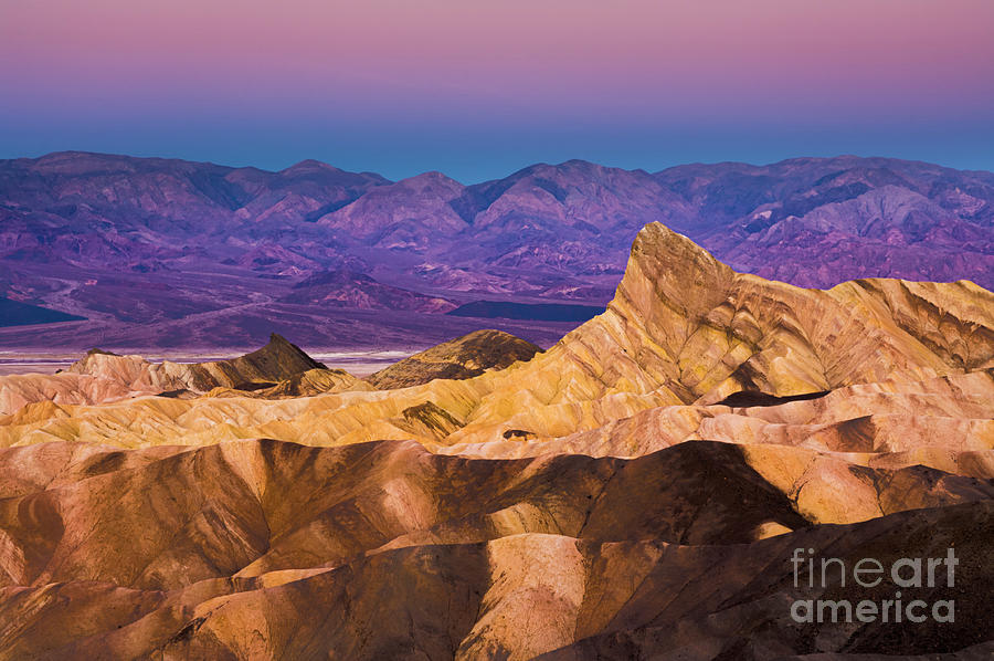 Pre-dawn at Zabriskie Point, Death Valley, California Photograph by Neale And Judith Clark
