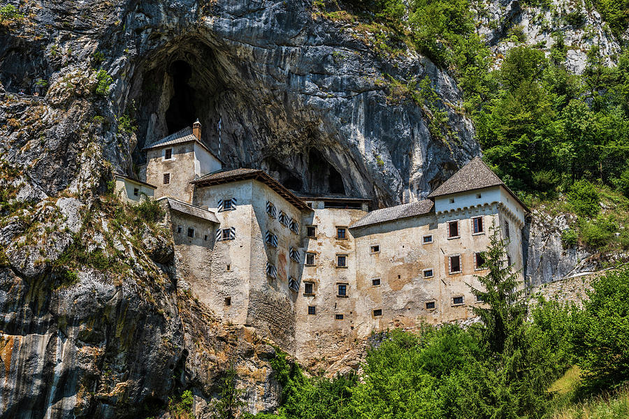 Predjama Castle in Slovenia Photograph by Artur Bogacki